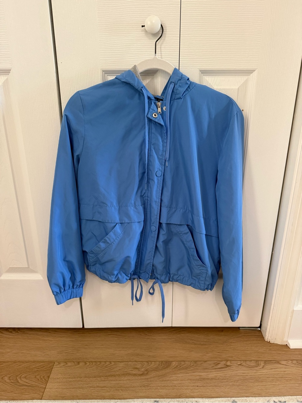 Divided Light Blue Hooded Rain Jacket